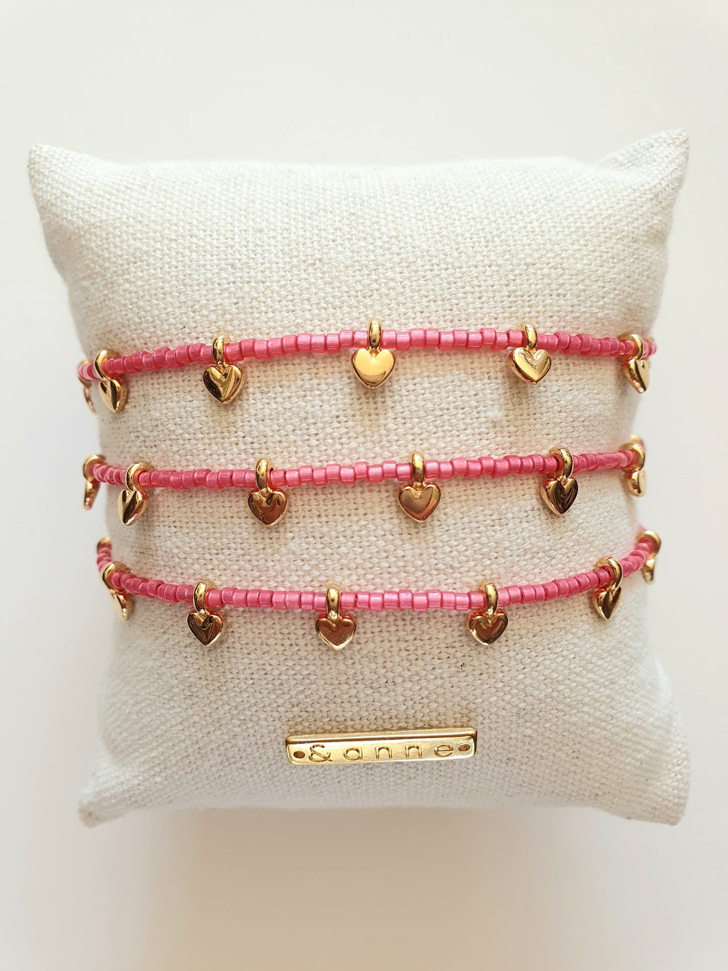 armband - hartjes/fuchsia roze